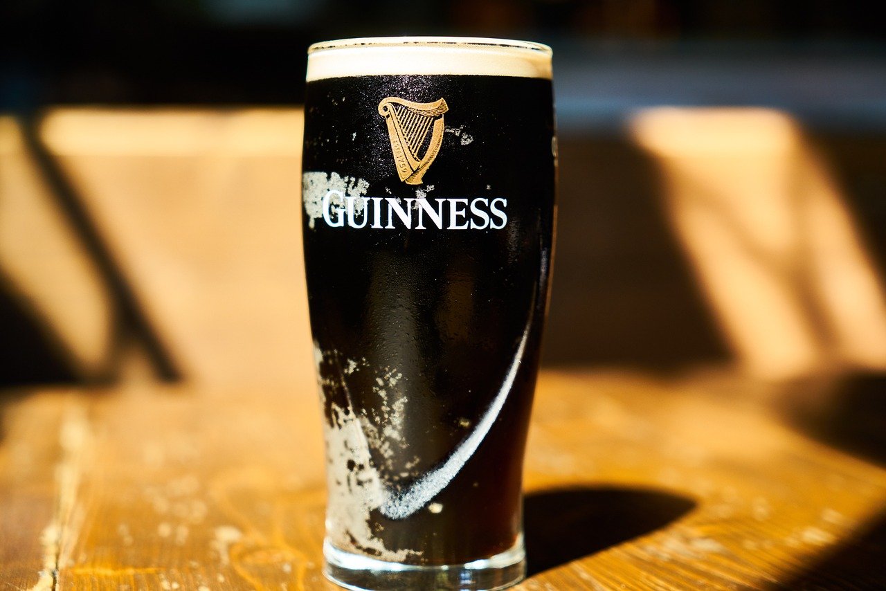 Guinness glass on a bar table